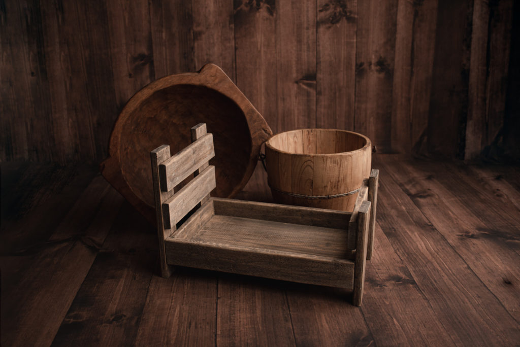 Pensacola, FL Newborn Photographer showing Image of Photography Wooden Props of a Bed, Bowl and Bucket