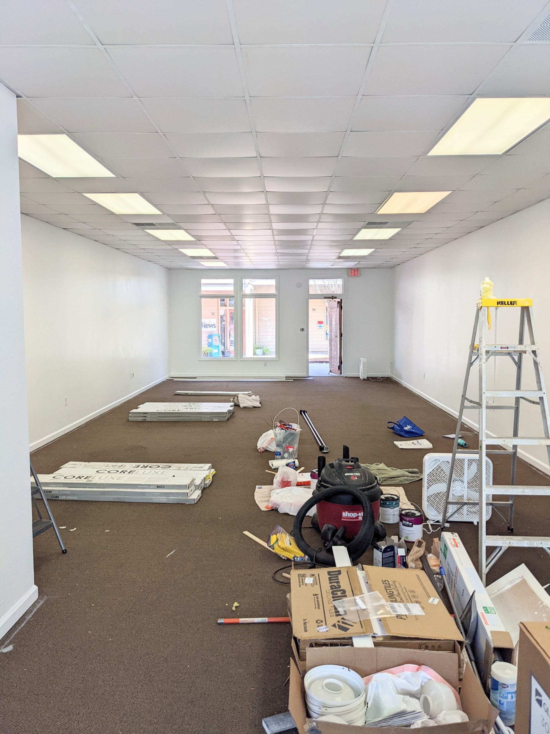 Inside of photography studio showing freshly painted white walls