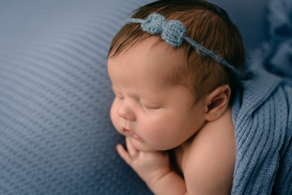 Pensacola,FL Newborn Photographer.  Profile image of newborn baby girl