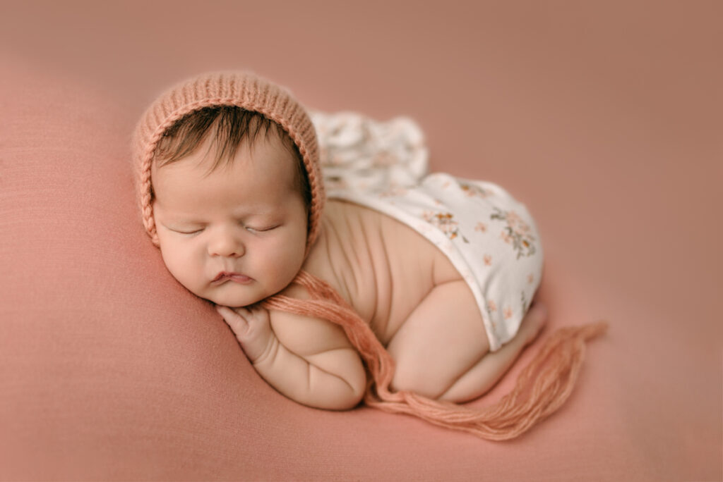 Pensacola,FL Newborn Photographer.  Newborn baby girl in bum up pose.